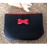 Trousse pochette L cloutée en similicuir noir nœud rouge Création artisanale